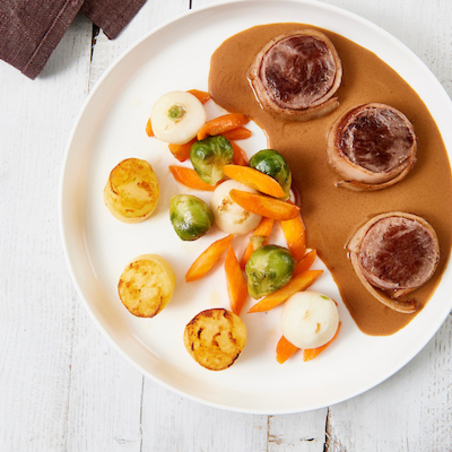 Tournedos de cerf avec des pommes de terre confites